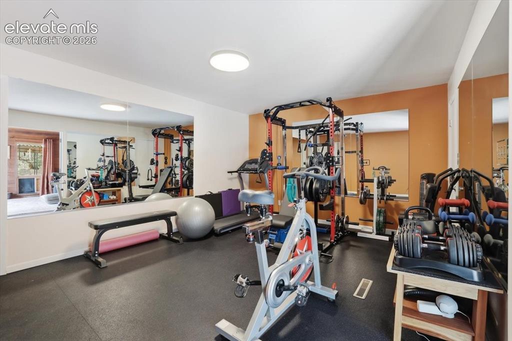 Image 36 of 50: Bedroom used as a gym