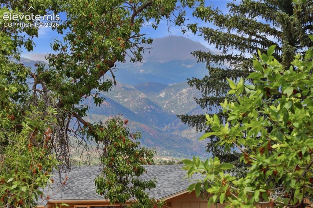 Image 4 of 50: Pikes Peak views from the front deck