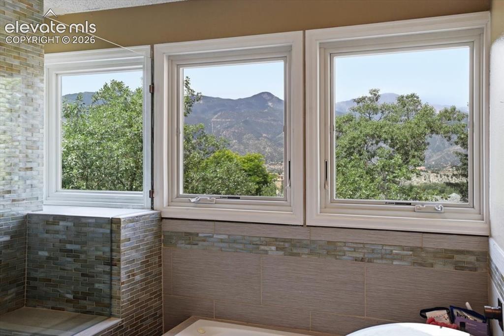 Image 5 of 50: Amazing views from the primary bathroom!