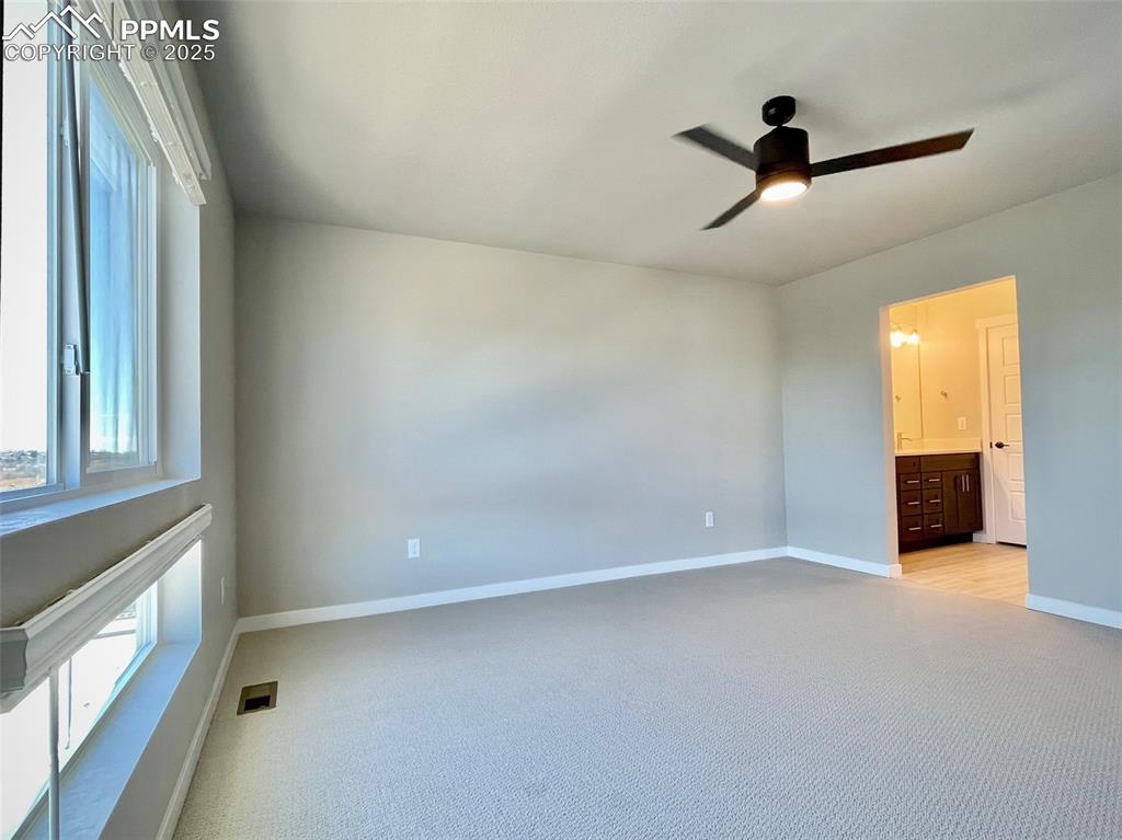 Image 21 of 26: Master Bedroom