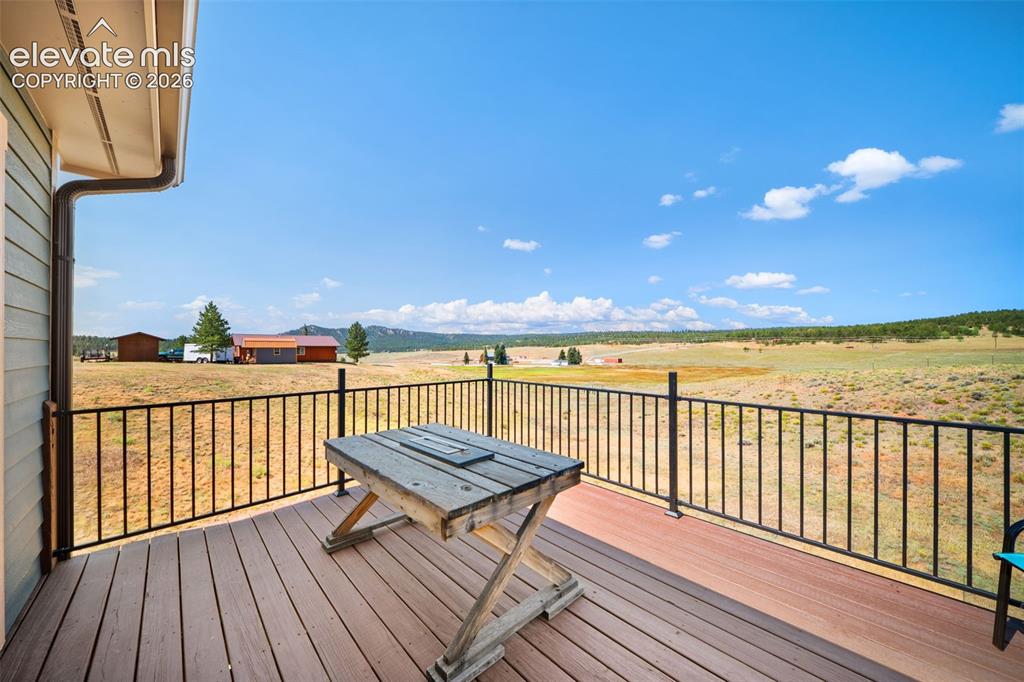 Image 24 of 41: Expansive valley and mountain views from the rear deck.