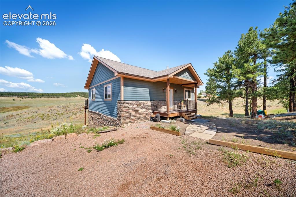 Image 3 of 39: Set on a beautiful lot with open views.