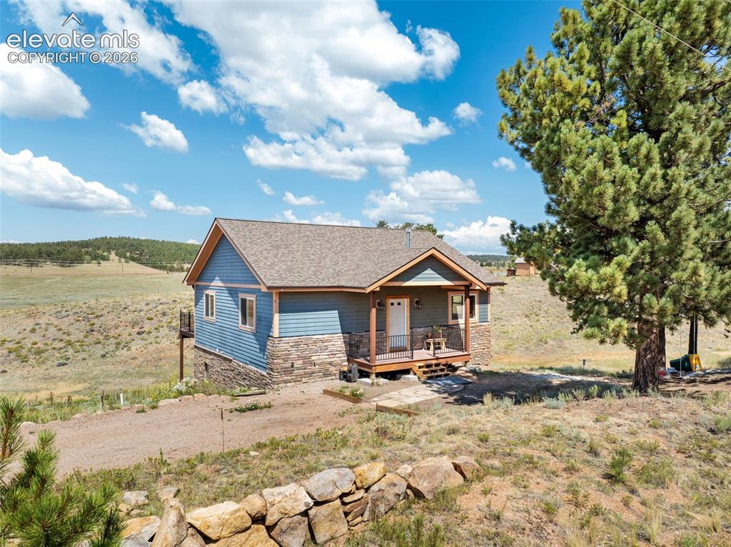 Image 3 of 41: Set on a beautiful lot with open views.
