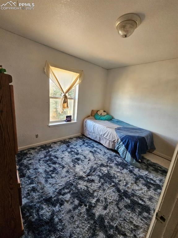 Image 18 of 26: Bedroom