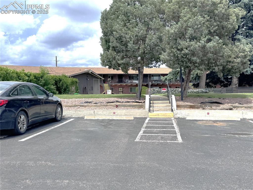 Image 28 of 30: View of uncovered parking lot