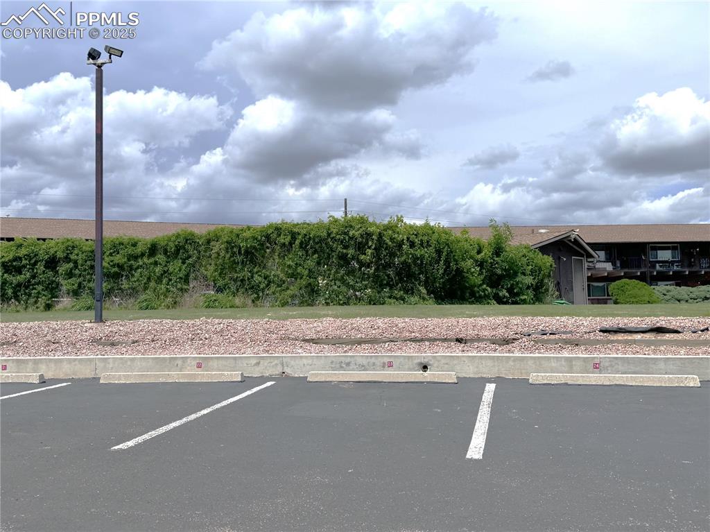 Image 29 of 30: View of uncovered parking lot