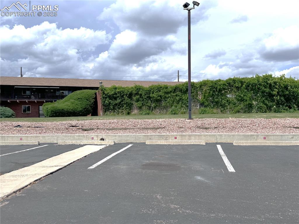 Image 30 of 30: View of uncovered parking lot