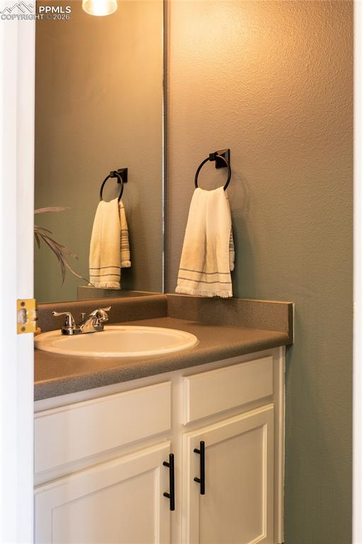 Image 10 of 23: Bathroom featuring vanity