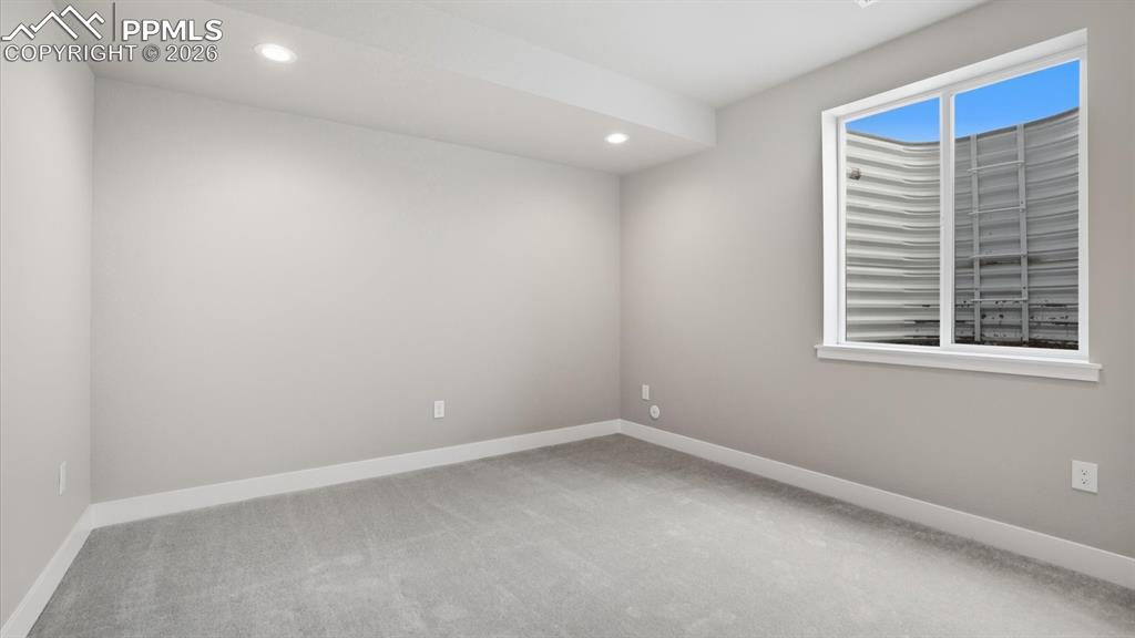 Image 36 of 50: Basement Family Room.