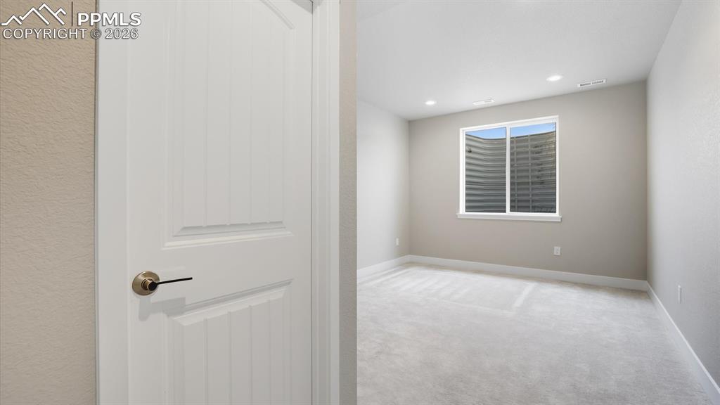 Image 40 of 50: Double sink vanity with quartz countertops in Basement Bathroom.