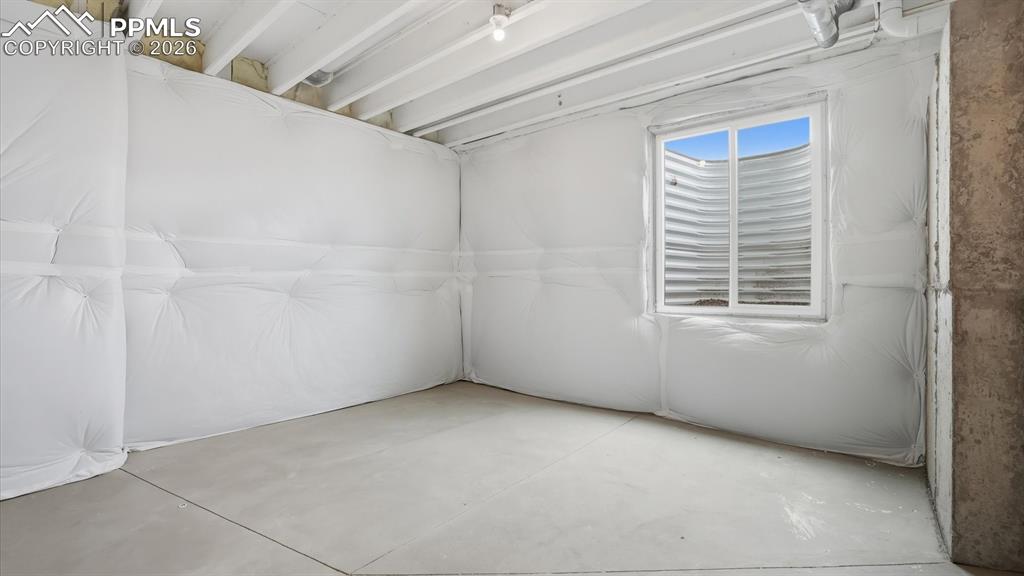 Image 42 of 50: Bedroom #5 with neutral carpet.