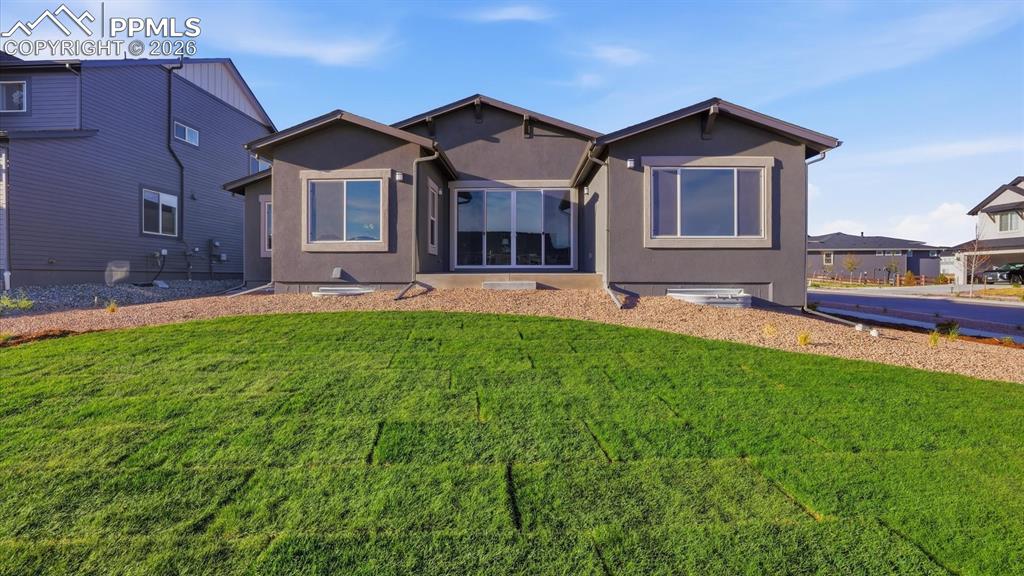 Image 44 of 50: 3-car attached garage.