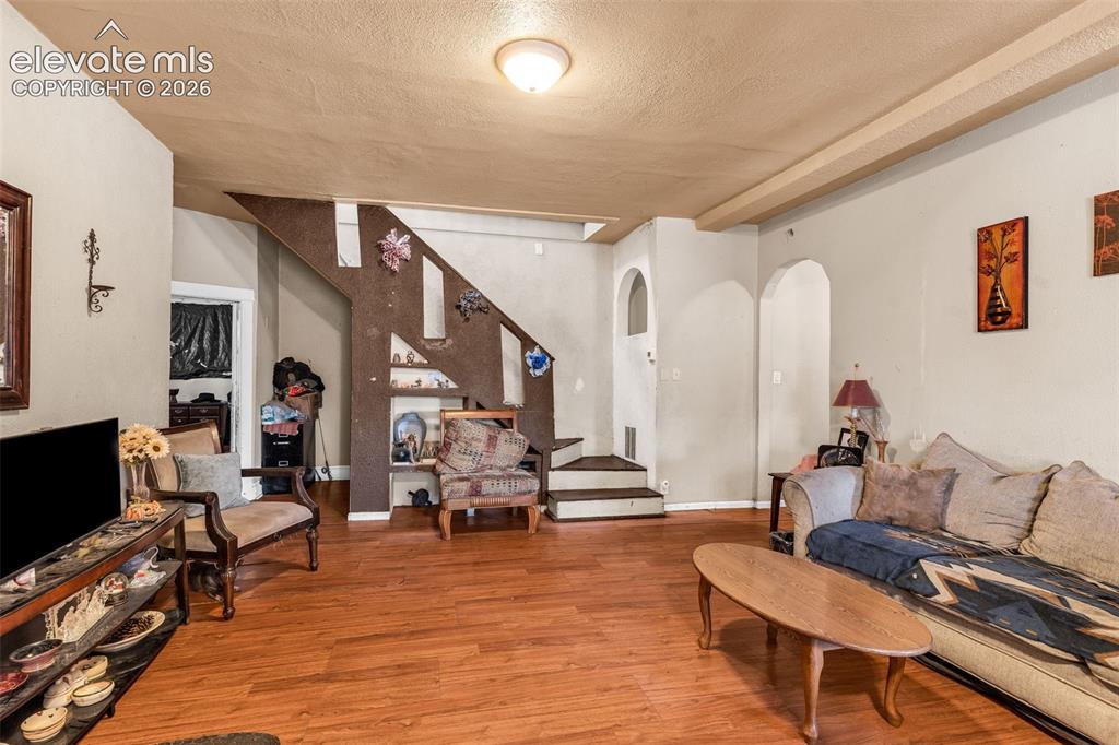 Image 5 of 31: Wood-finish flooring throughout the main living space