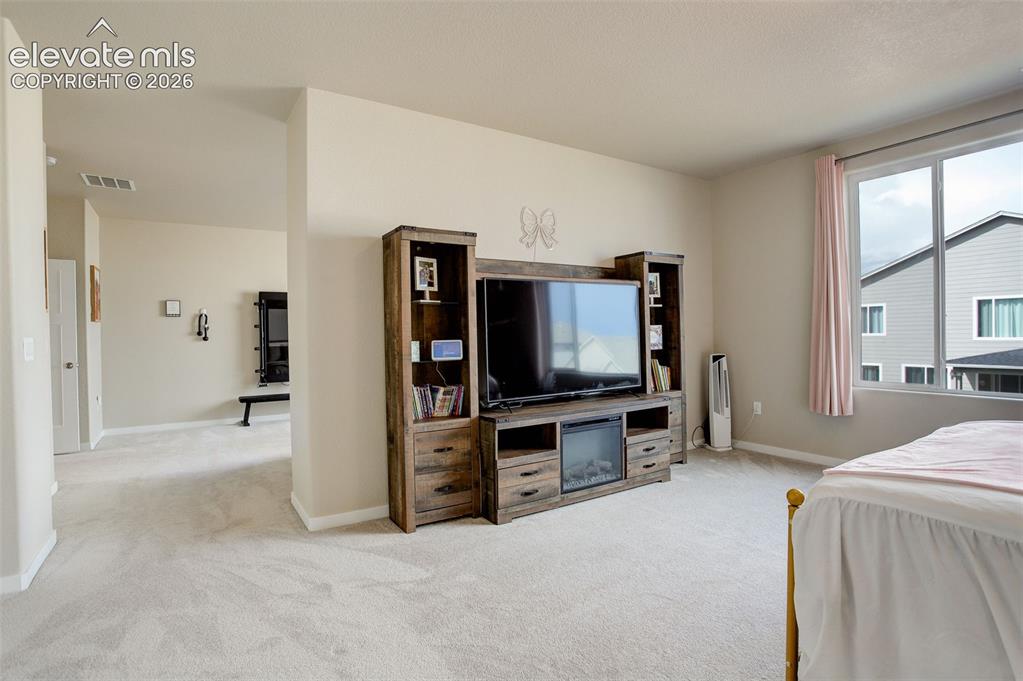 Image 28 of 50: The upper-level primary ensuite is a true retreat; this spa-inspired ensuit
