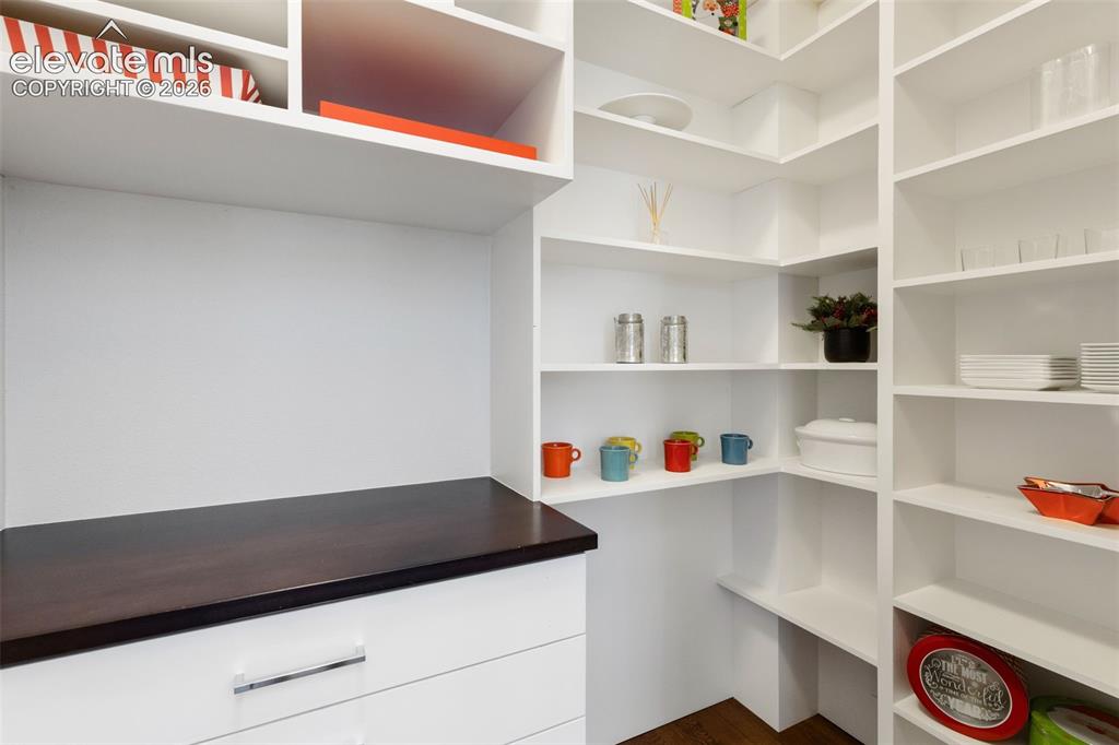 Image 16 of 50: Hidden Butlers Pantry