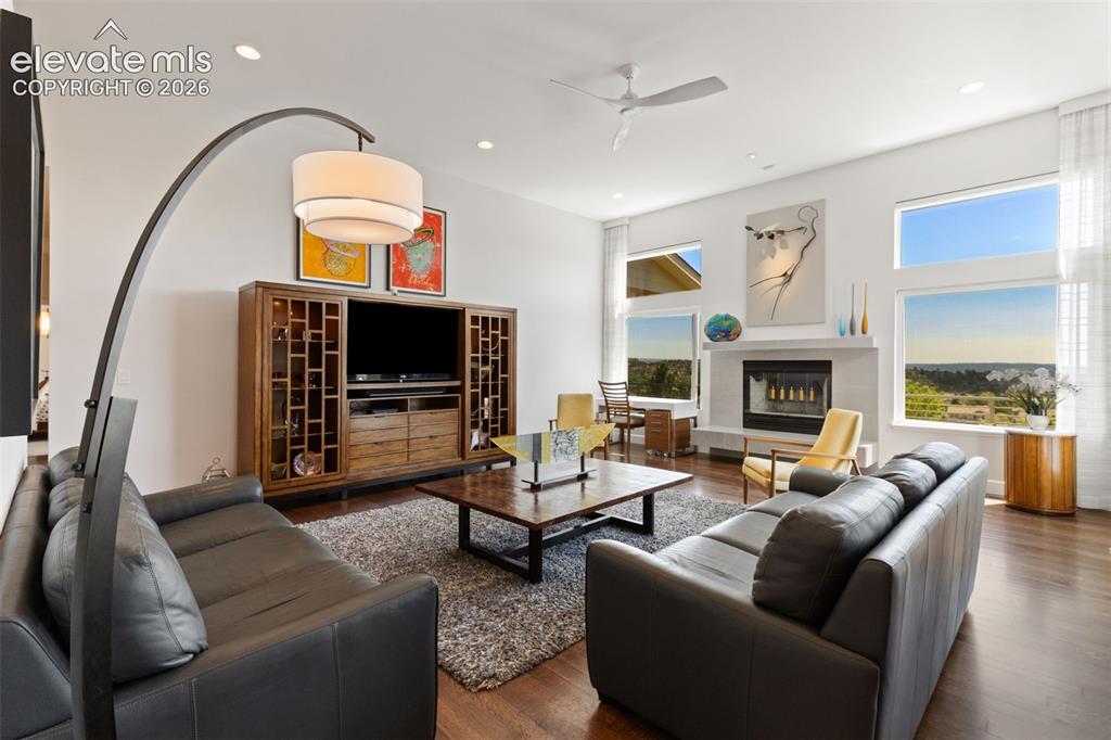 Image 23 of 50: Inviting Great Room with Wood Burning Fireplace