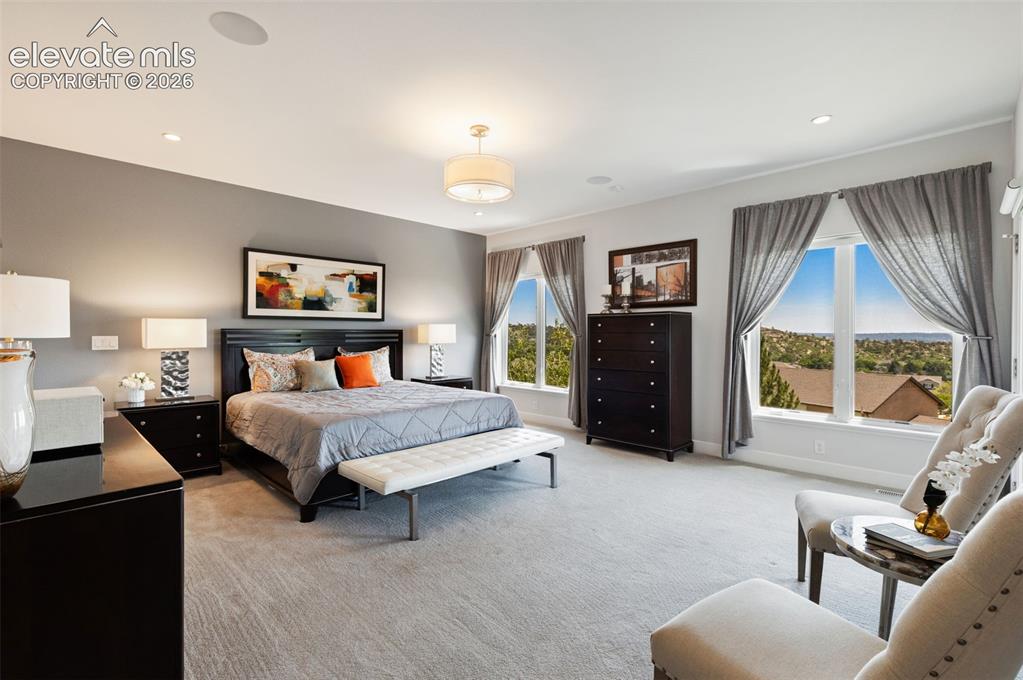 Image 26 of 50: Large Primary Bedroom with Sitting Area