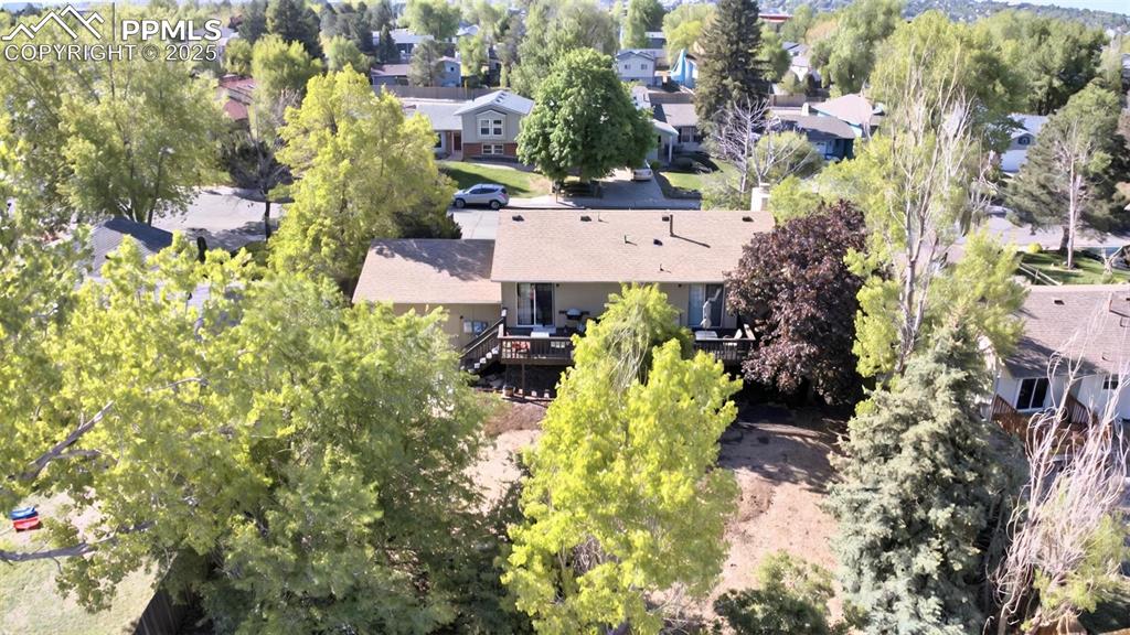 Image 22 of 25: Drone / aerial view of a tree filled landscape