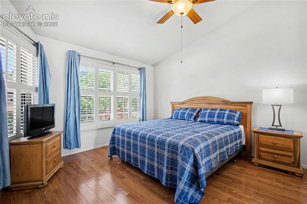 Image 12 of 25: Upper level primary bedroom with lots of light 
