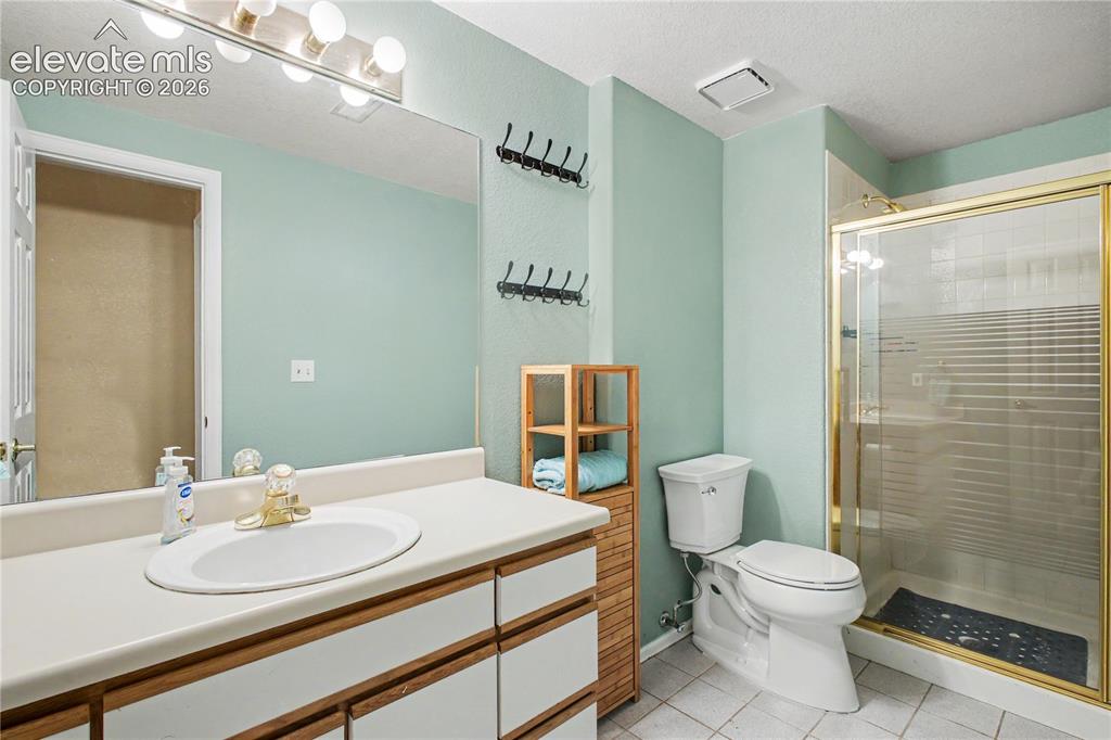 Image 19 of 25: Bathroom in lower level outside bedroom
