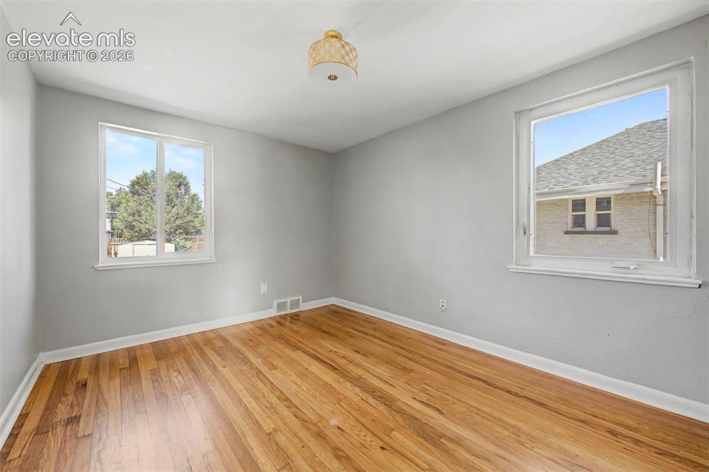 Image 24 of 40: Carpeted family room