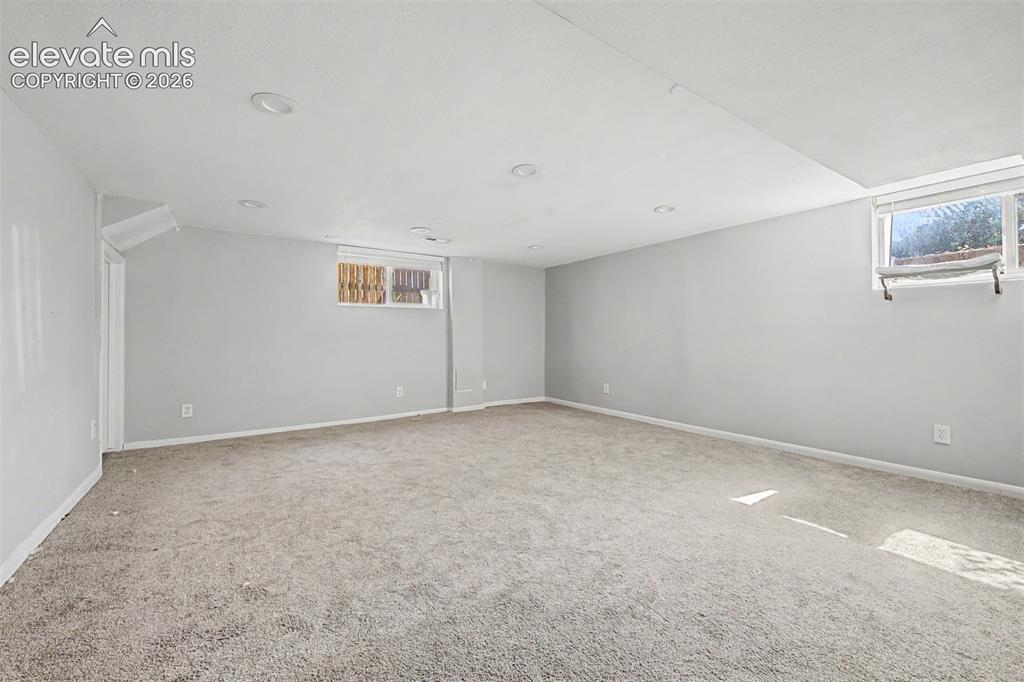 Image 26 of 40: Basement bedroom is non-cornforming with a walk-in closet.