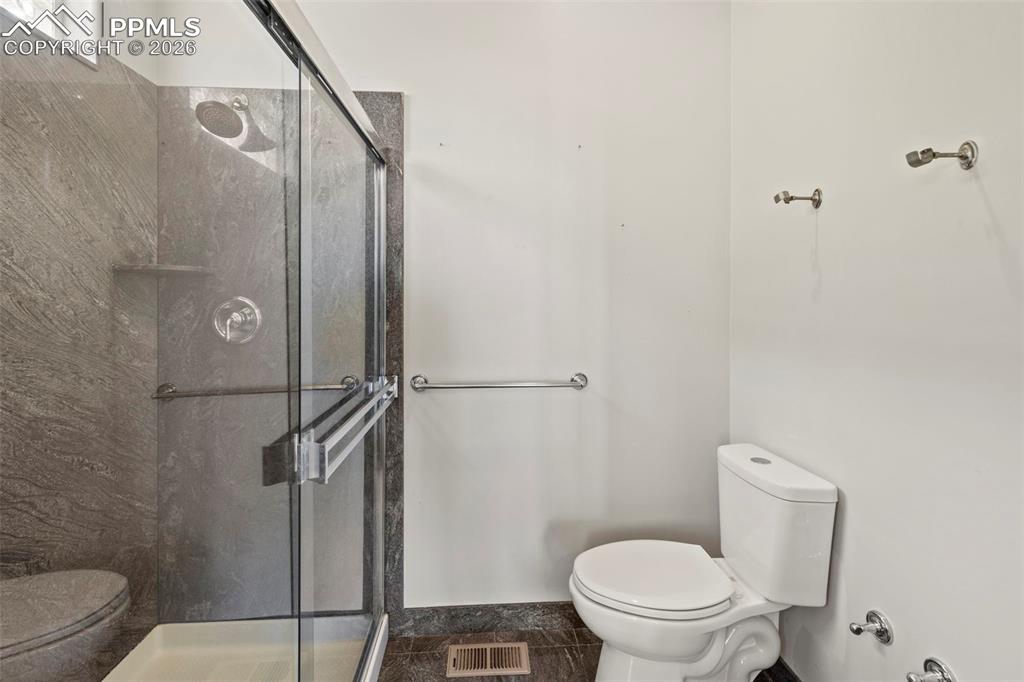 Image 28 of 50: Master Bedroom