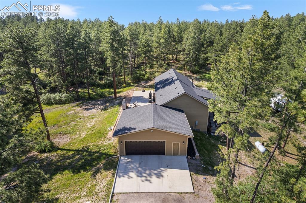 Caption: View of subject property featuring a forest