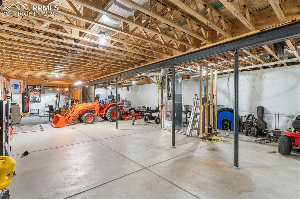 Image 29 of 46: Basement featuring heating unit