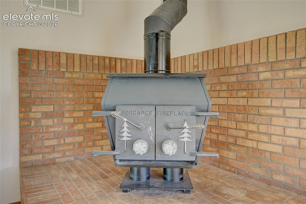 Image 6 of 39: Fireplace