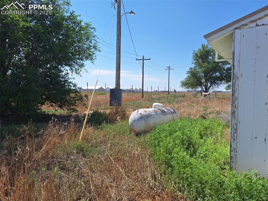 Image 12 of 24: Exterior view of propane tank
