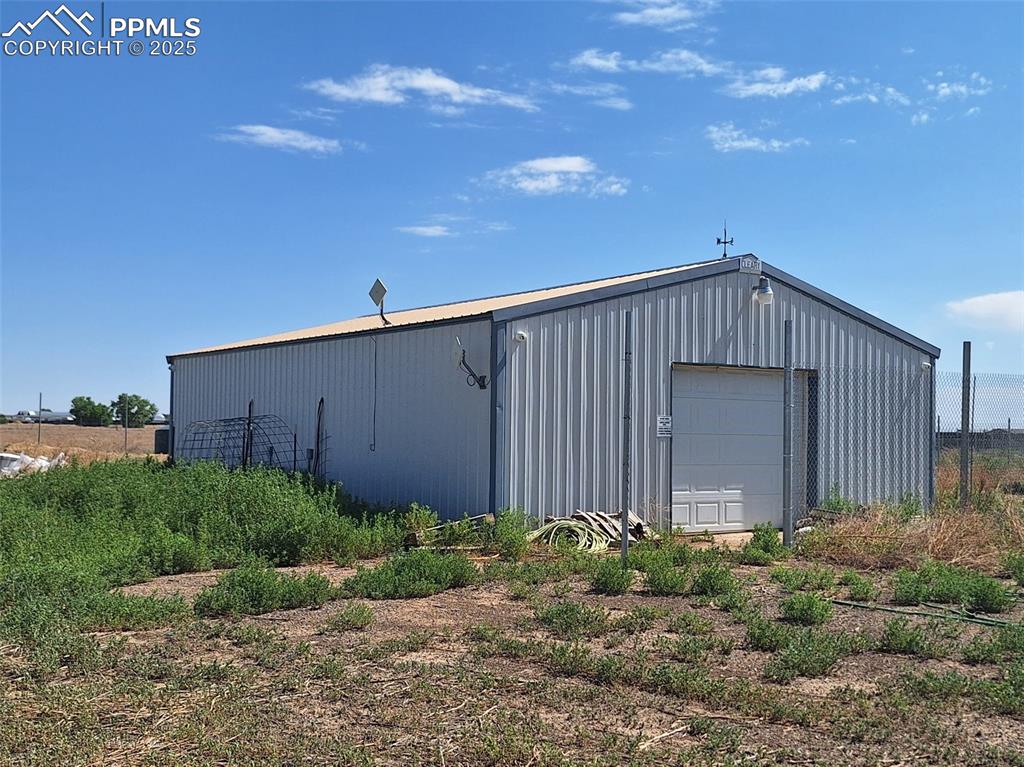 Image 8 of 24: View of outbuilding