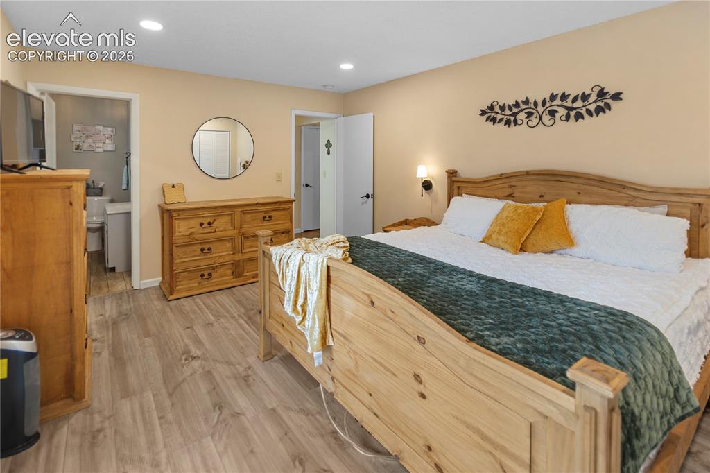 Image 11 of 31: Main Level Master Bedroom