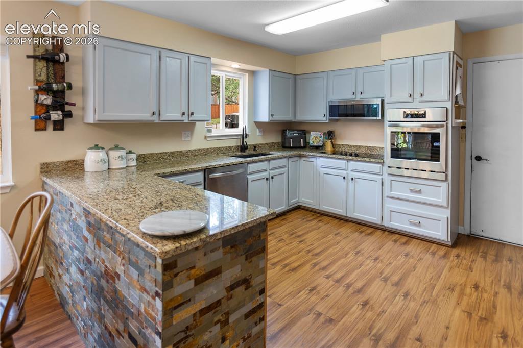 Image 8 of 31: Dining and Kitchen