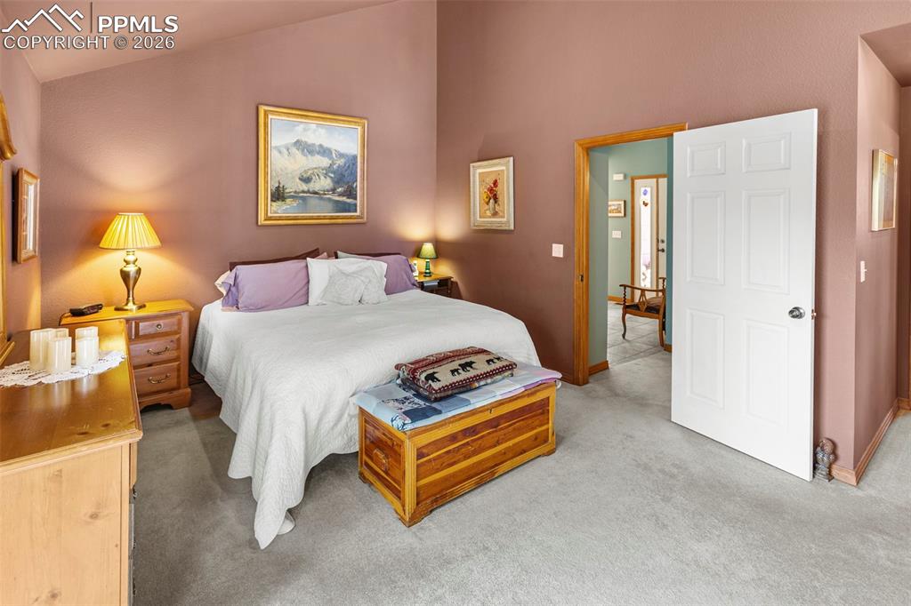 Image 13 of 26: Main Level Master Bedroom