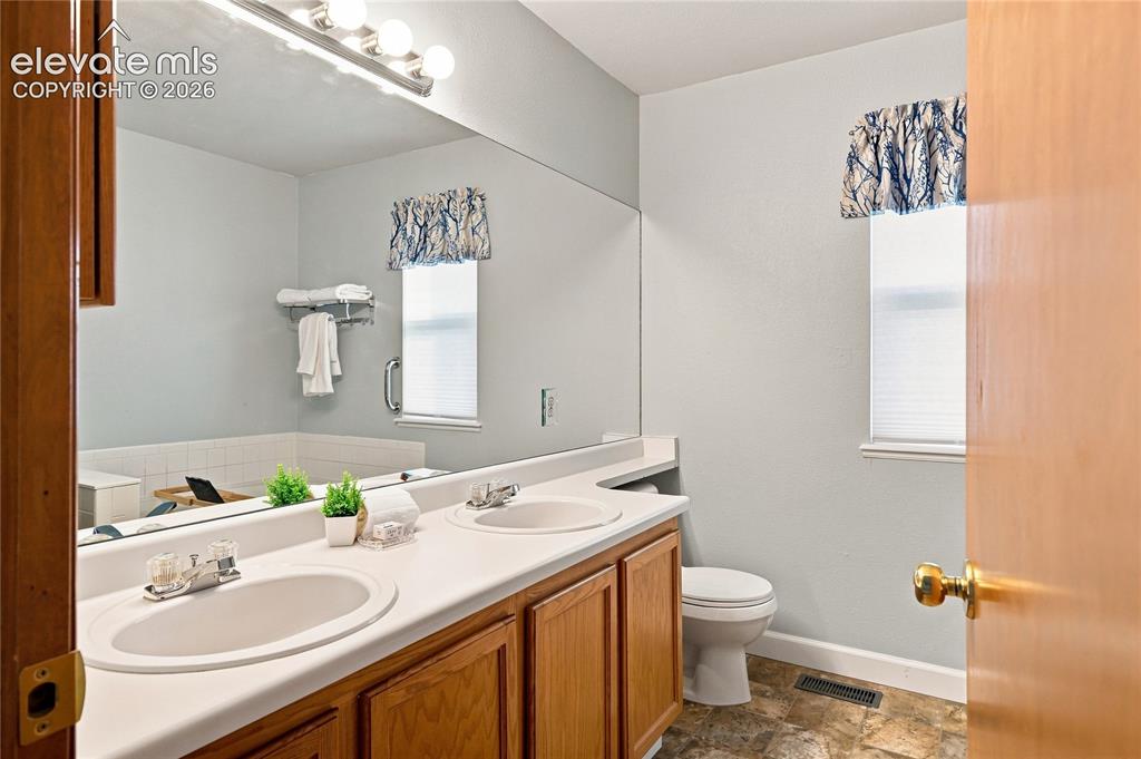Image 12 of 27: Primary bedroom bath