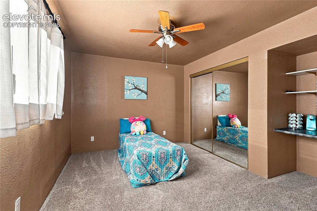 Image 20 of 27: Bedroom