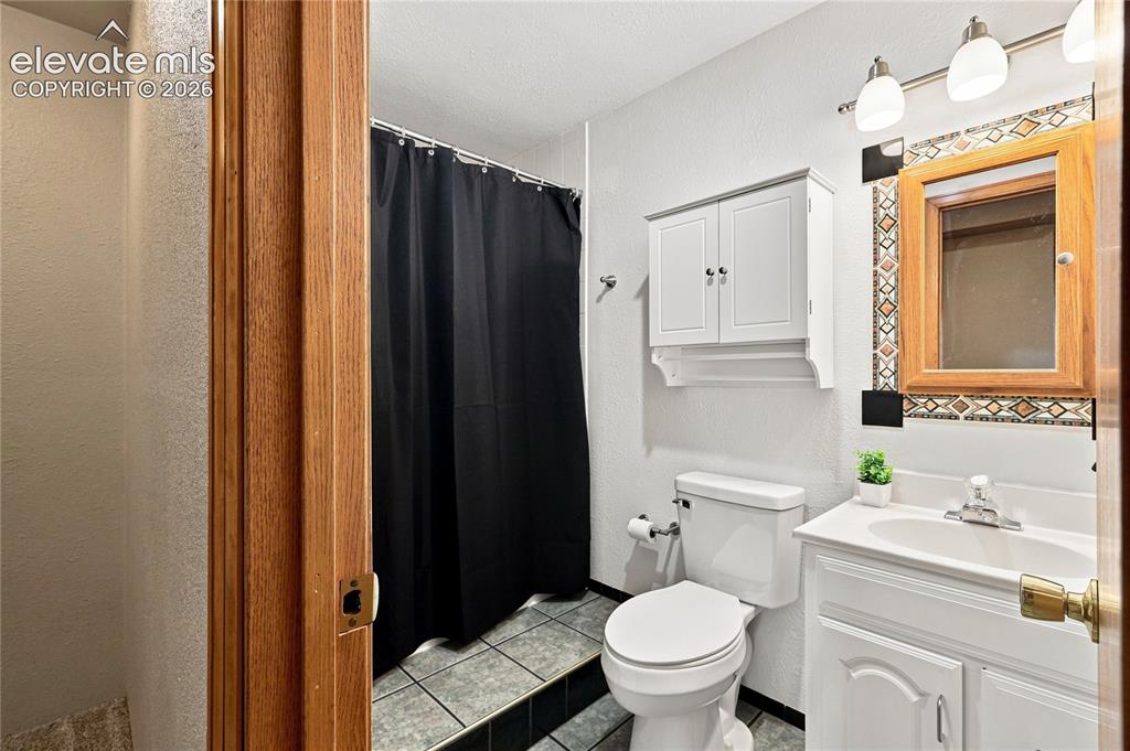 Image 23 of 27: Basement bath
