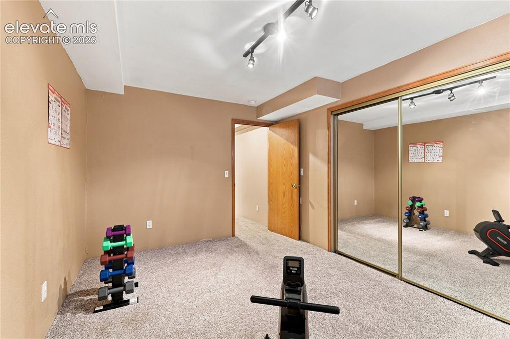 Image 24 of 27: Basement bedroom