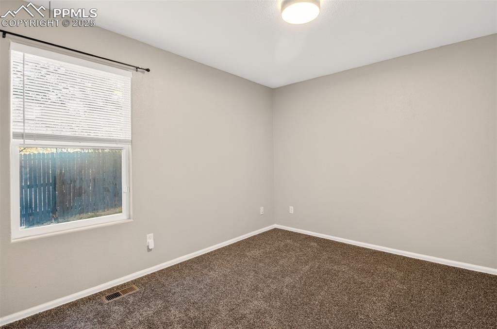 Image 16 of 24: Bedroom #2 also has new paint/carpet.