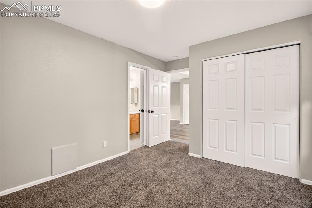 Image 17 of 24: Bedroom #2 with private access to the full bathroom.