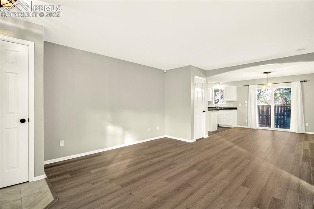 Image 4 of 24: Another view of living room w/closet.