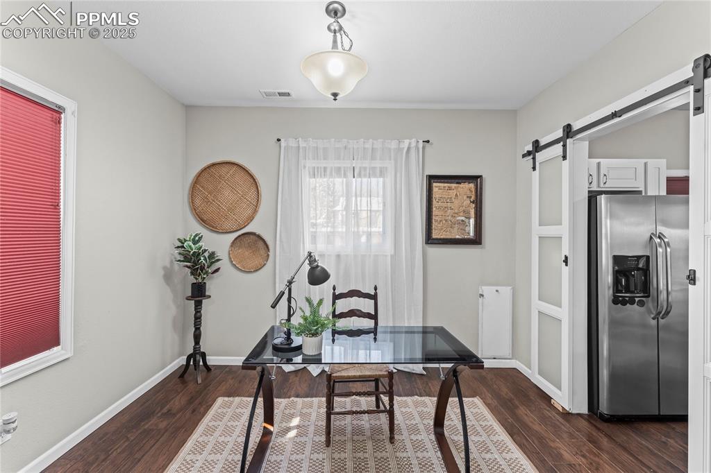 Image 6 of 23: Dining area or office area