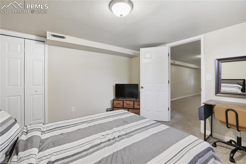 Image 19 of 39: Bedroom