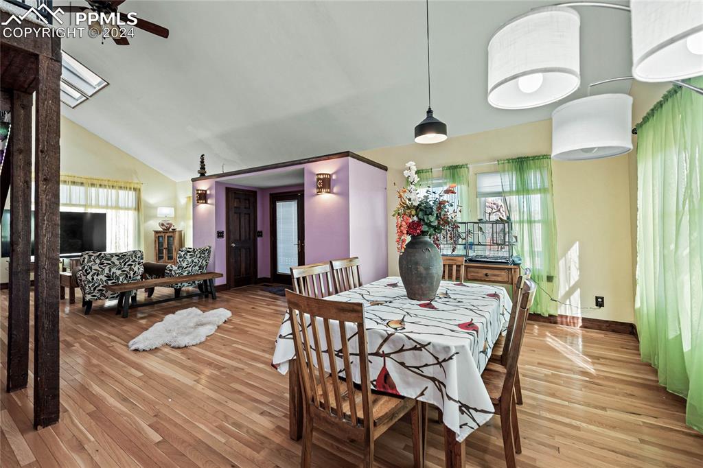 Image 12 of 48: Great Room-Dining room with light hardwood / wood-style floors, plenty of n