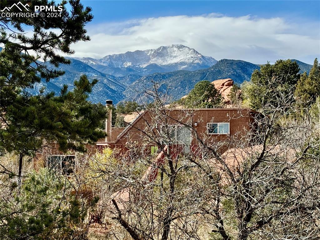 Image 18 of 48: Mountain view from Primary bedroom deck