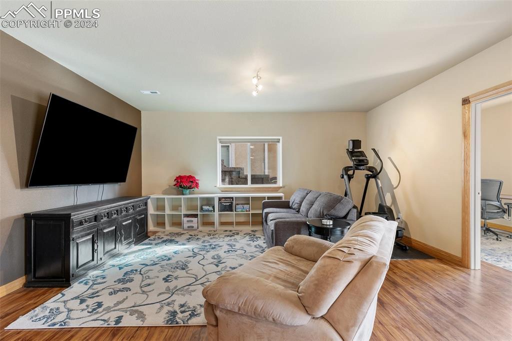 Image 24 of 39: Basement family room.
