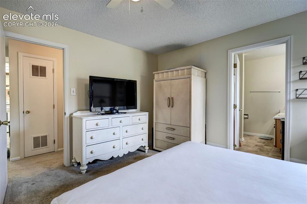 Image 12 of 25: Another view of this spacious bedroom
