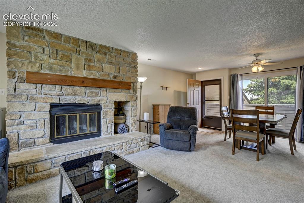 Image 6 of 25: Another View of the Living Room and Dining Area