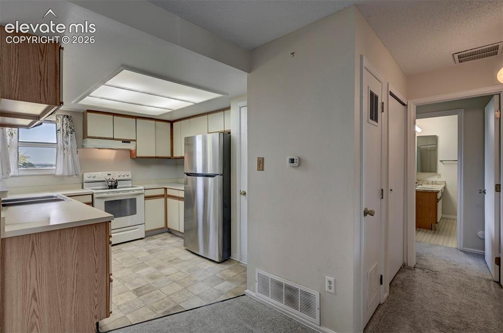 Image 8 of 25: Open Kitchen layout and all appliances are included